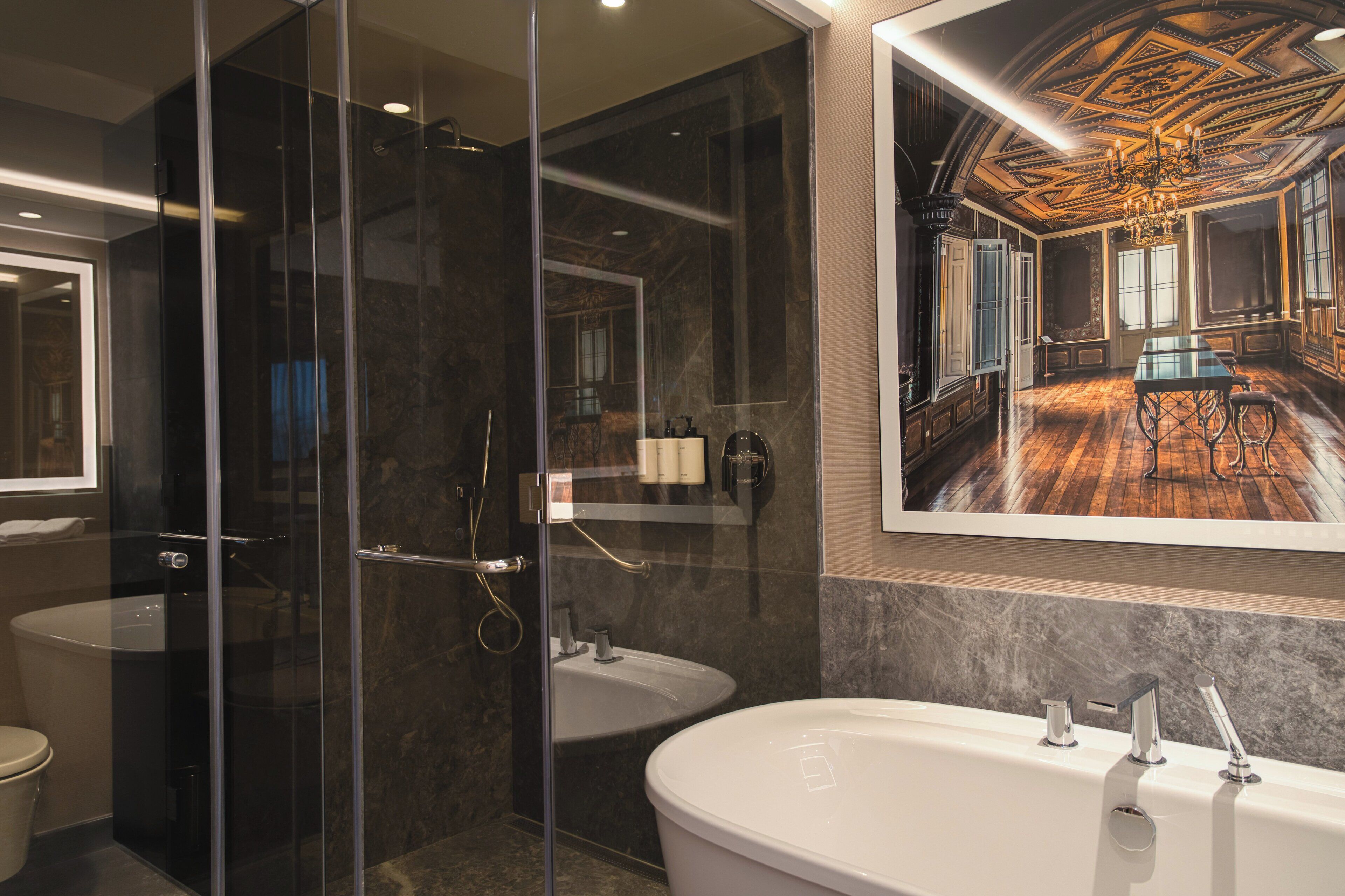 Separate tub and shower, free toiletries, hair dryer, bathrobes