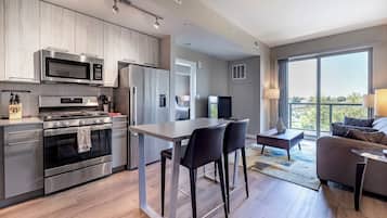 Luxury Apartment, Balcony | Private kitchen | Full-size fridge, microwave, oven, stovetop
