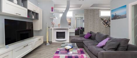 Luxury Apartment, Balcony, Partial Sea View | Living area
