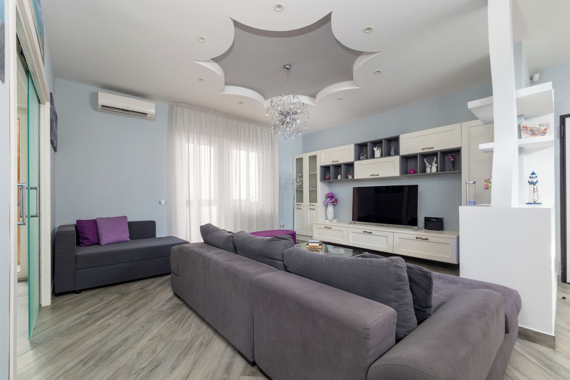 Luxury Apartment, Balcony, Partial Sea View | Living area | 50-inch Smart TV with digital channels, Netflix, streaming services
