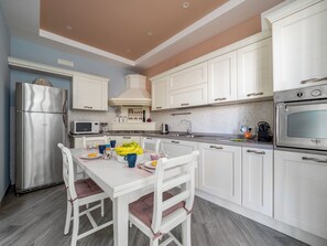 Luxury Apartment, Balcony, Partial Sea View | Private kitchen | Espresso maker, electric kettle - Partenope (Piano di Sorrento)