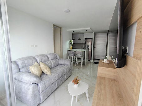 Living area. Apt in Giron, 3 blocks from the main park and 15 minutes from the airport!