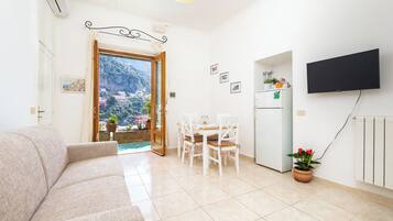 Panoramic House, Sea View | Living area | 40-inch flat-screen TV with digital channels