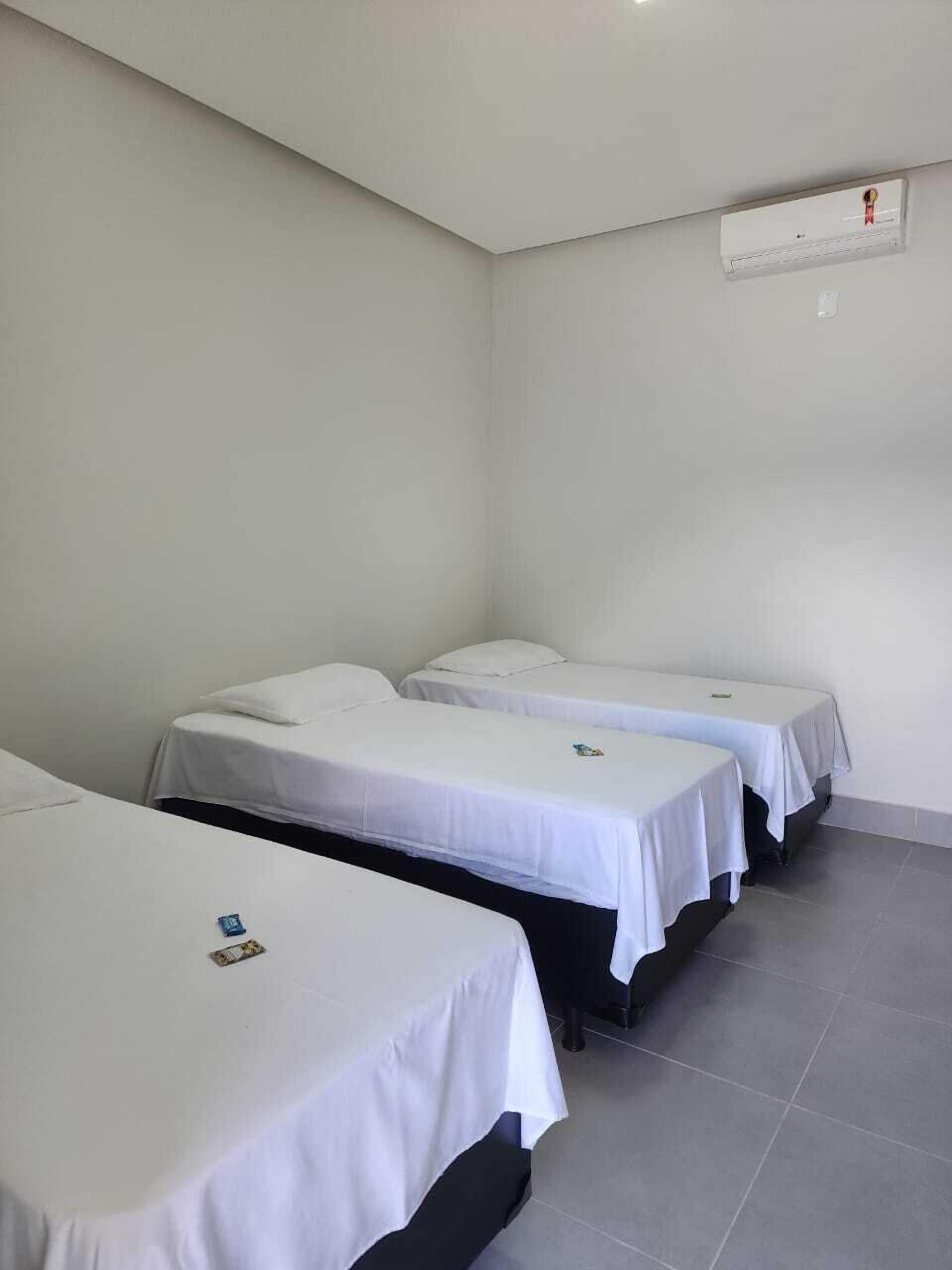 Triple Room, Patio | Desk, free WiFi