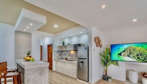 Fridge, microwave, stovetop, coffee/tea maker