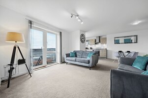 Business Apartment, Balcony, City View | Living area | 50-inch Smart TV with digital channels, Netflix, streaming services