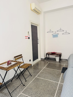 Classic Quadruple Room, City View | Desk, laptop workspace, free WiFi