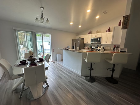 Fridge, microwave, oven, stovetop. Charming 3-bedroom house in serene Eustis with POOL! Mins to Downtown MT. DORA.