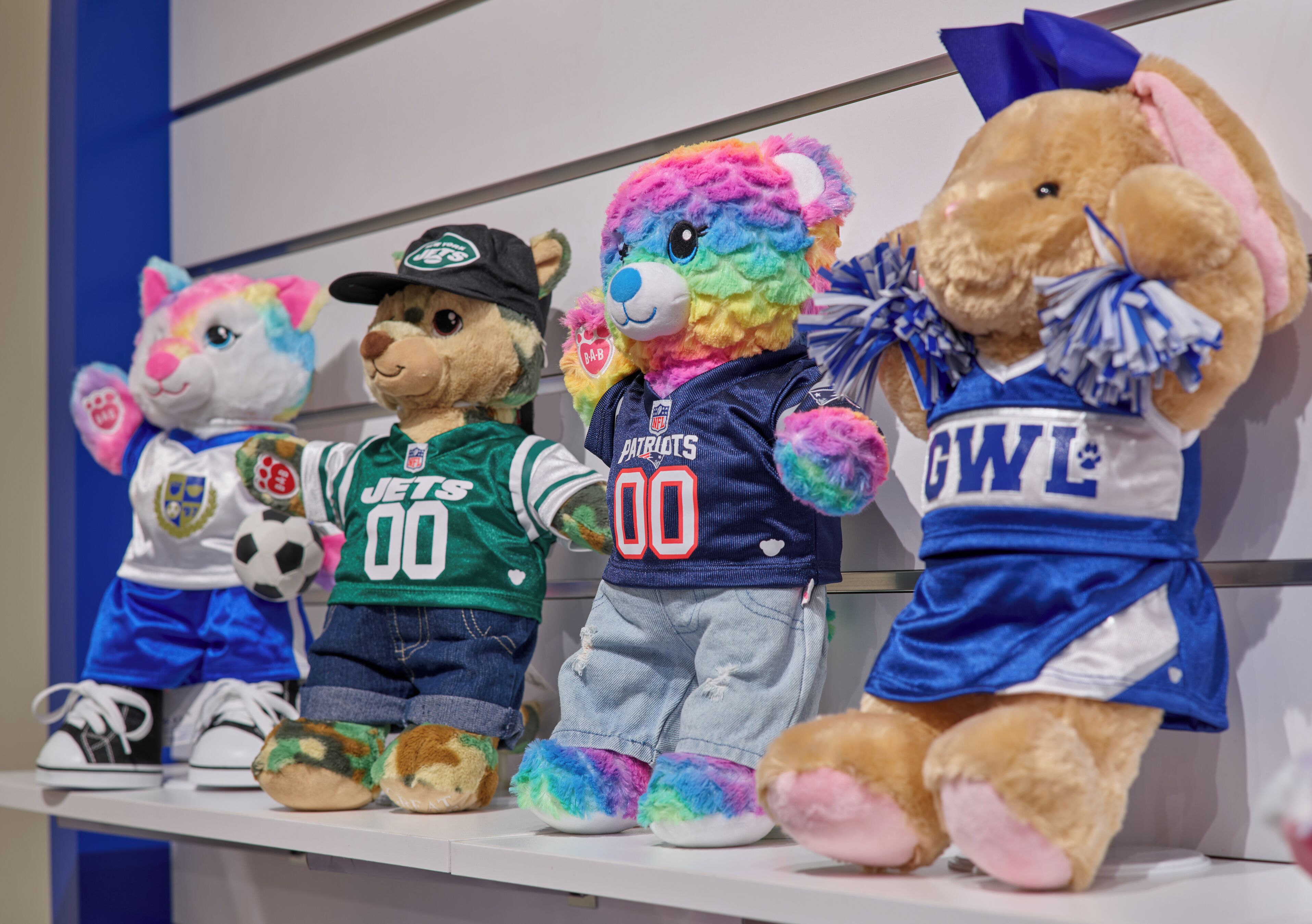 Plush toys on a shelf.