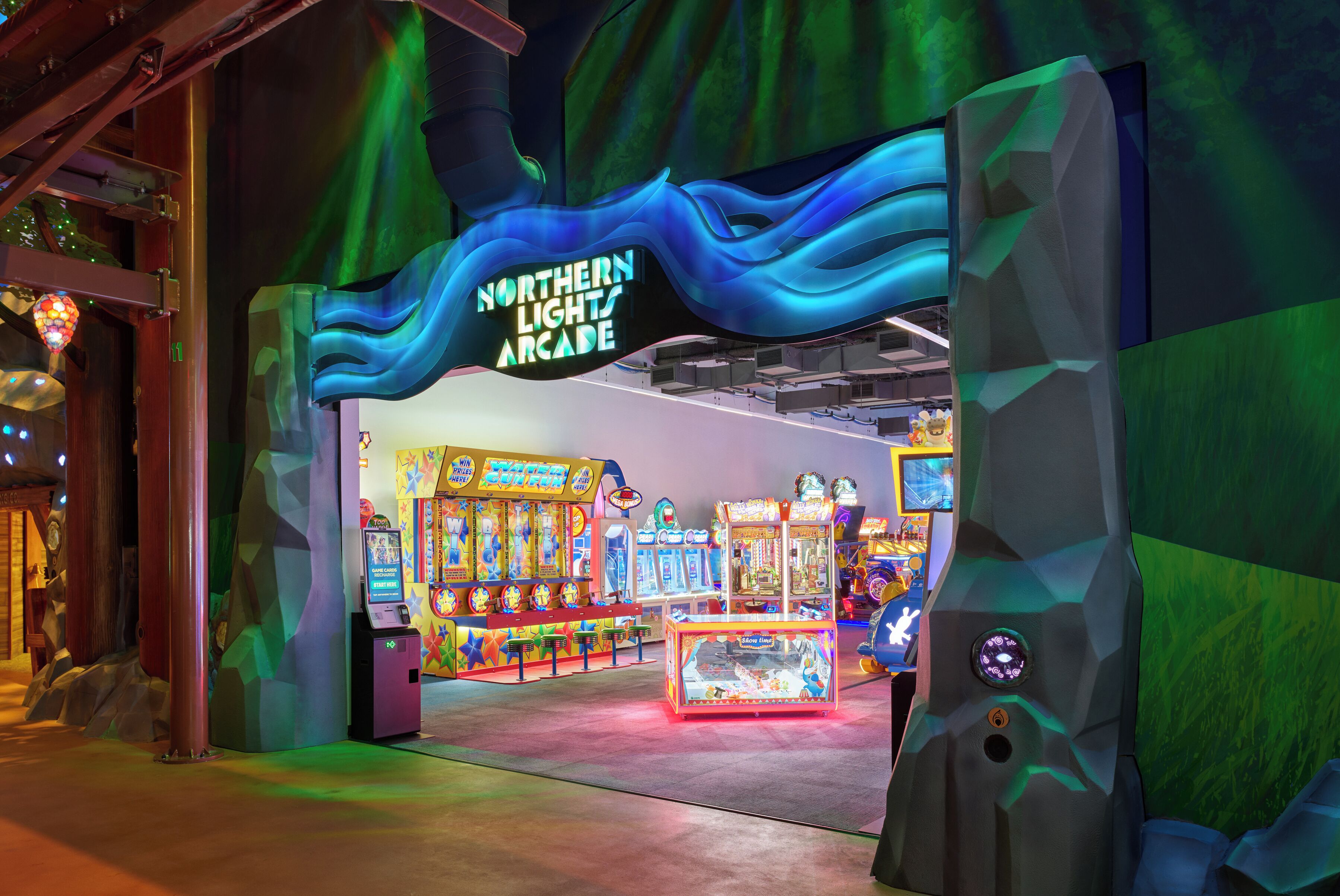 An arcade entrance with a sign reading "Northern Lights Arcade" and various gaming machines inside.