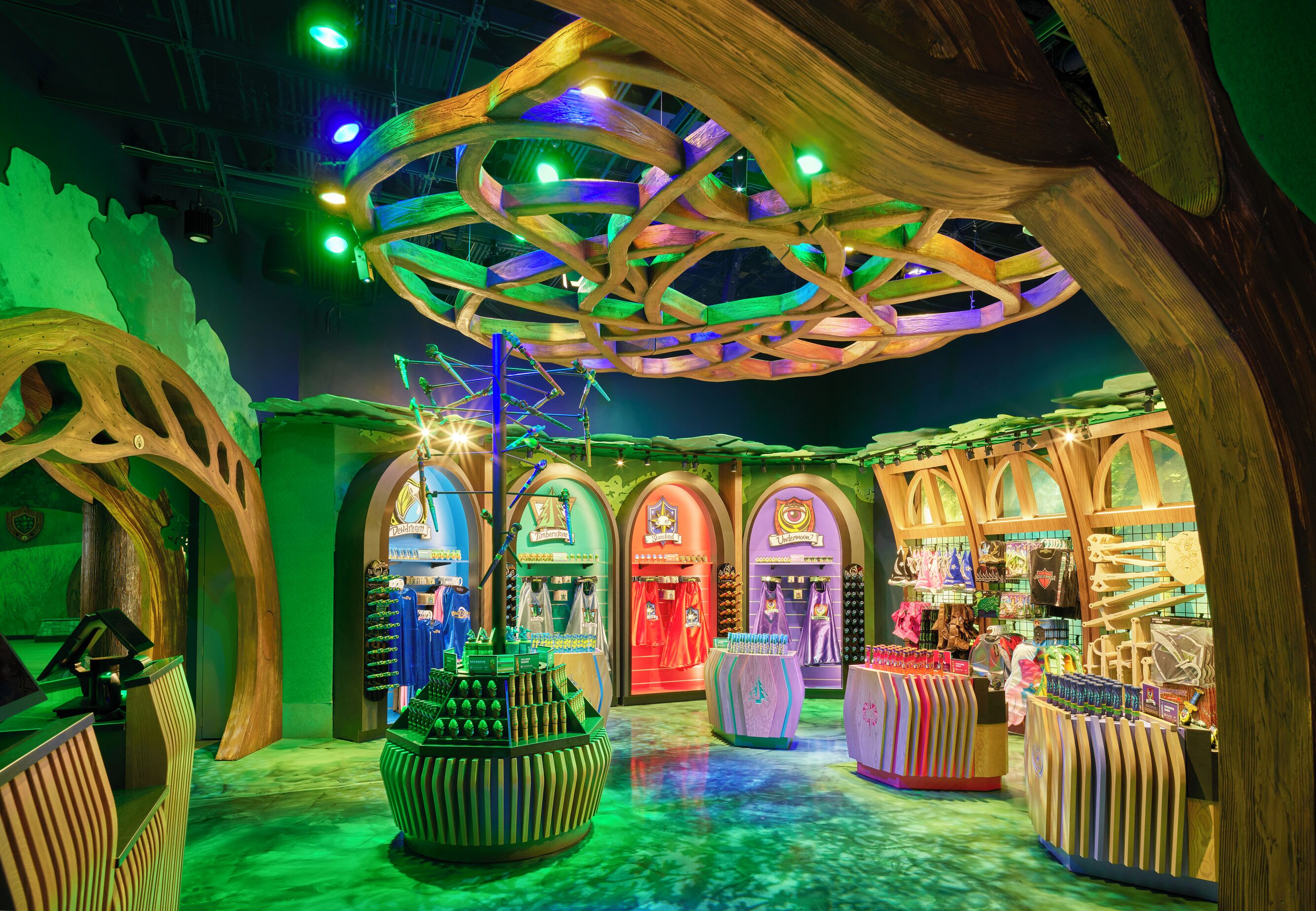 A brightly lit indoor space with wooden structures and arches, featuring various displays and merchandise.