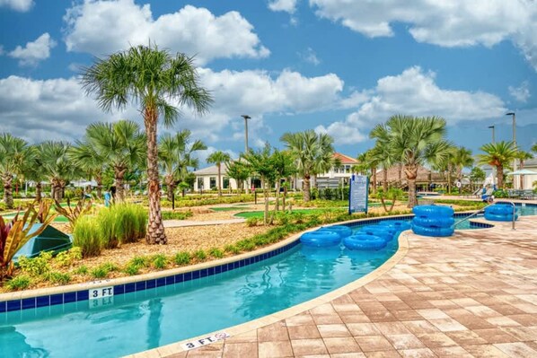 A swimming pool with a 3 ft depth marker, surrounded by palm trees and a tiled deck. - Private Disney Oasis With Pool Hot Tub Ps5 and Modern Amenities (Kissimmee)
