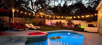  2 homes next to each other.Heated Pool, Spa & Backyard Games! 