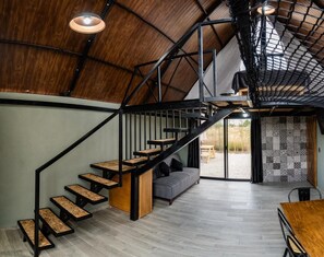 Cabaña Pirul | Área de sala de estar | Televisión de pantalla plana