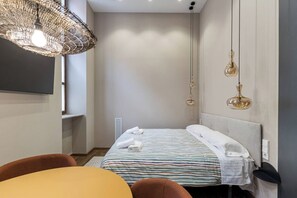 1 slaapkamer, een strijkplank/strijkijzer, wifi, beddengoed