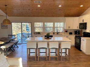 Fridge, microwave, oven, stovetop - Charming Lake Front 3-bedroom cabin in Fair Play with Hot Tub & Private Dock (Fair Play)