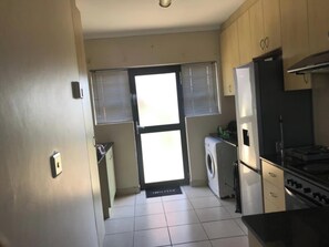 Apartment, 2 Bedrooms, Smoking, Balcony | Private kitchen - Relax and Unwind in a Beautiful Open-plan Space!" (Kariega)