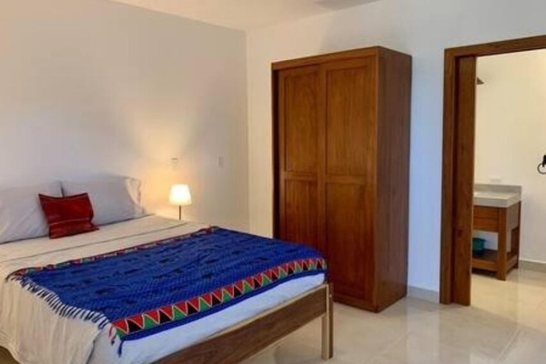 the two bedrooms are the same with queen beds, private bath, ceiling fan and AC