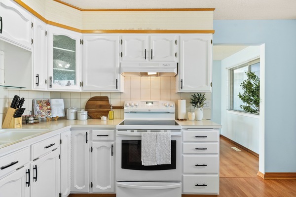 Fridge, dishwasher, coffee/tea maker, cookware/dishes/utensils