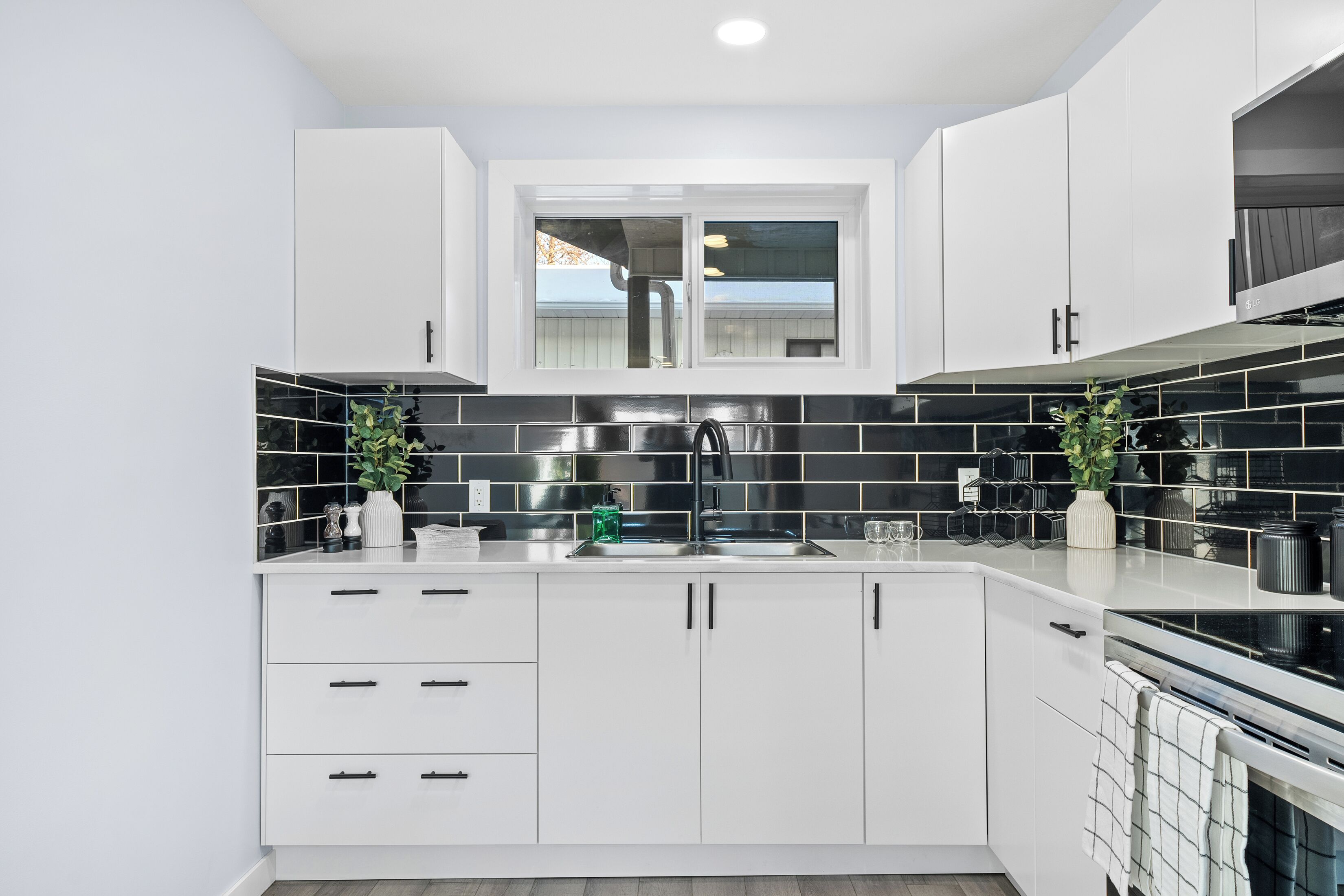 Fridge, dishwasher, coffee/tea maker, cookware/dishes/utensils