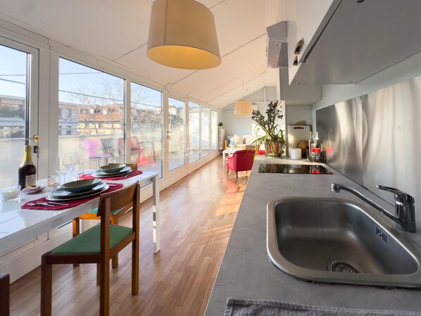 Microwave, stovetop, highchair, cookware/dishes/utensils