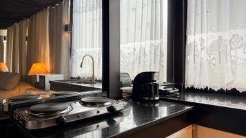 Suite Comfort | Cucina privata | Mini-frigorifero, microonde, piano cottura, frullatore