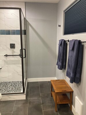 Shower, towels, soap, toilet paper