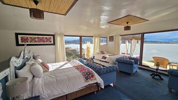 Deluxe Suite, Balcony, Lake View | Laptop workspace, bed sheets