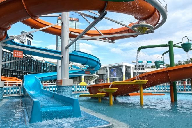 A water park with multiple slides and pools.