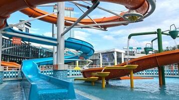 A water park with multiple slides and pools.