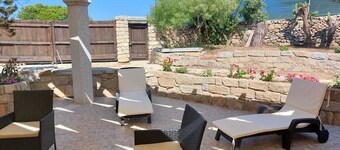 Charming 2-bedroom cottage in welcoming La Maddalena with AC, WiFi
