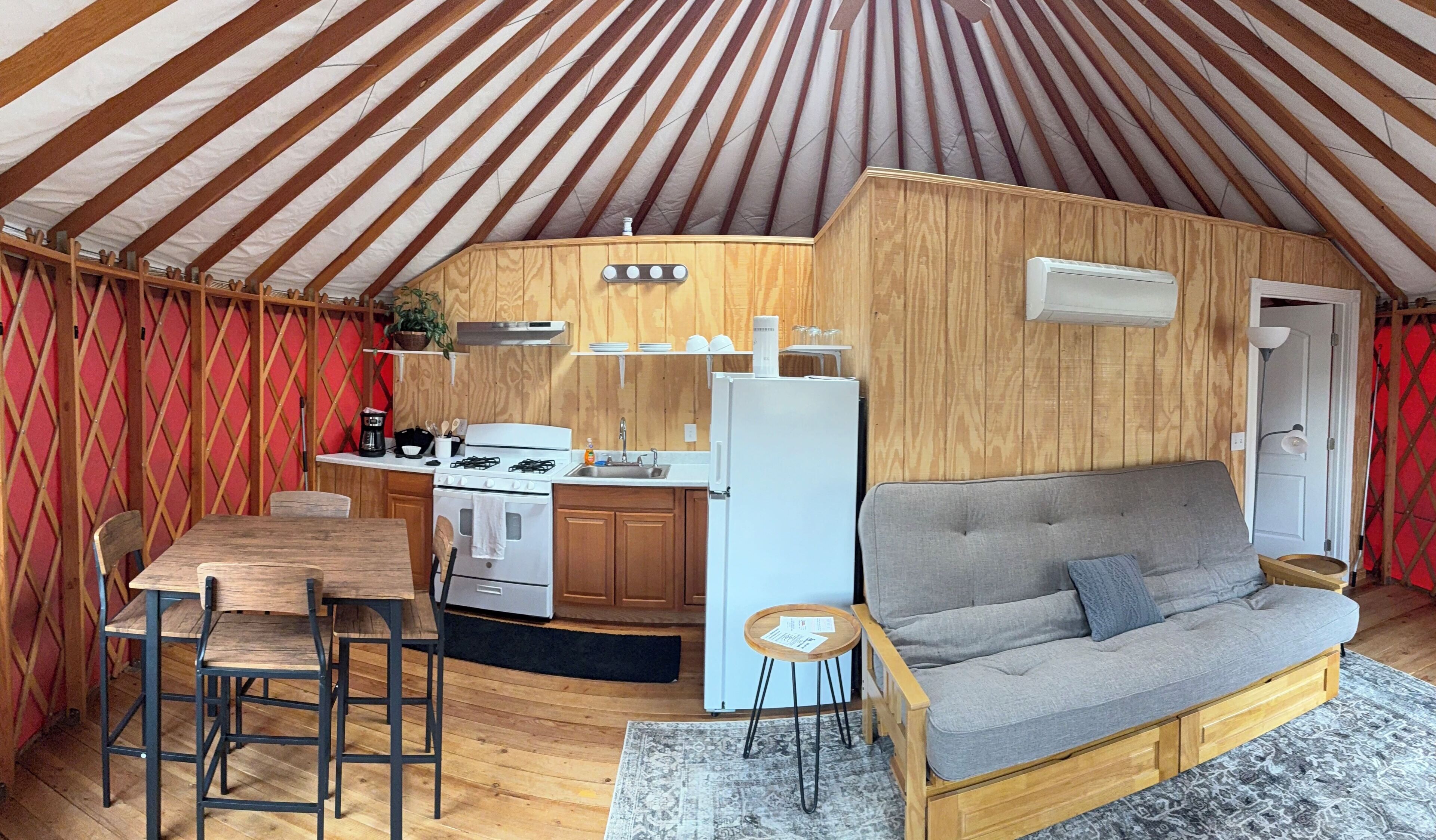 Camping Yurt | Living area | 27-inch flat-screen TV with cable channels