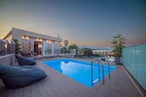 Piscine extérieure, piscine chauffée