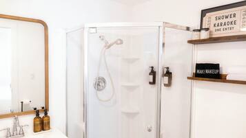 Shower, eco-friendly toiletries, hair dryer, towels