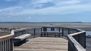 A wooden boardwalk leading to a beach with a sign indicating no swimming. - BEAUTY on The Sound!  Port Royal Hilton Head, Gorgeous, Peaceful Sleeps 6/2br2ba (Hilton Head)