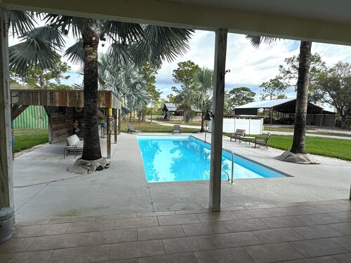 Private & Gated 4-bedroom house with 10.6 Acres, Game Rooms, Pool, Hot Tub, Bar