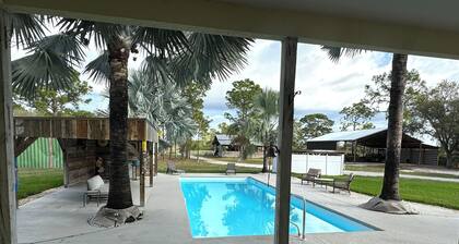 Private & Gated 4-bedroom house with 10.6 Acres, Game Rooms, Pool, Hot Tub, Bar