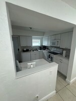 Comfort Double Room, Garden View | Private kitchen | Full-size fridge, microwave, oven, stovetop