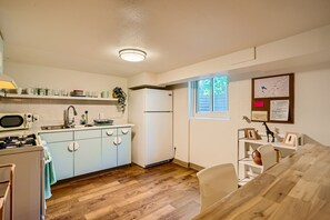 Fridge, microwave, oven, stovetop - Charming and Colorful Apartment at Sloans Lake (Denver)