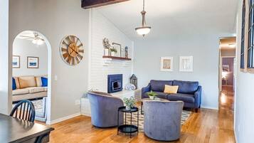 Smart TV, fireplace, books