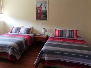 Double or Twin Room | Desk, laptop workspace, blackout drapes, iron/ironing board - Hotel Torre Esmeralda (Chilpancingo de los Bravo)