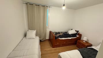 2 chambres, fer et planche Ă  repasser, draps fournis