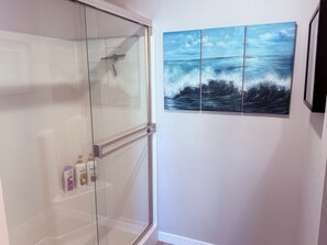 Shower, hair dryer, towels, soap