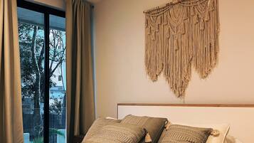 2 habitaciones, tabla de planchar con plancha, wifi y ropa de cama