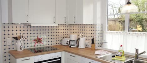 Réfrigérateur, four, plaque de cuisson, lave-vaisselle