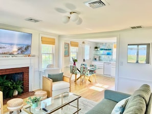 Smart TV, fireplace, books, stereo