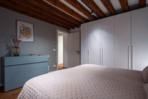 1 bedroom, desk, iron/ironing board, travel cot