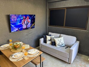 Studio | Living area | 32-inch Smart TV with digital channels