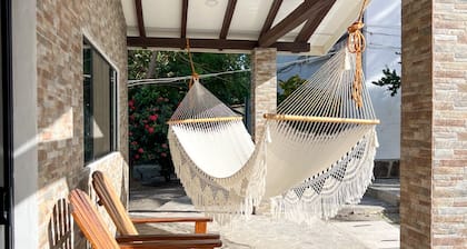 Beautiful modern tropical beach home + pool - steps away from ocean!