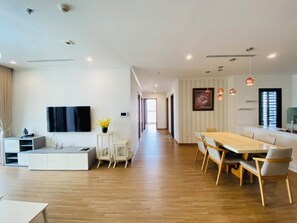 Apartment, 4 Bedrooms, City View | Living area | 55-inch flat-screen TV with cable channels, Netflix, streaming services - Vinhome Skylake Residence (Hanoi)